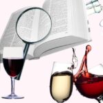 wine, book and magnifying glass